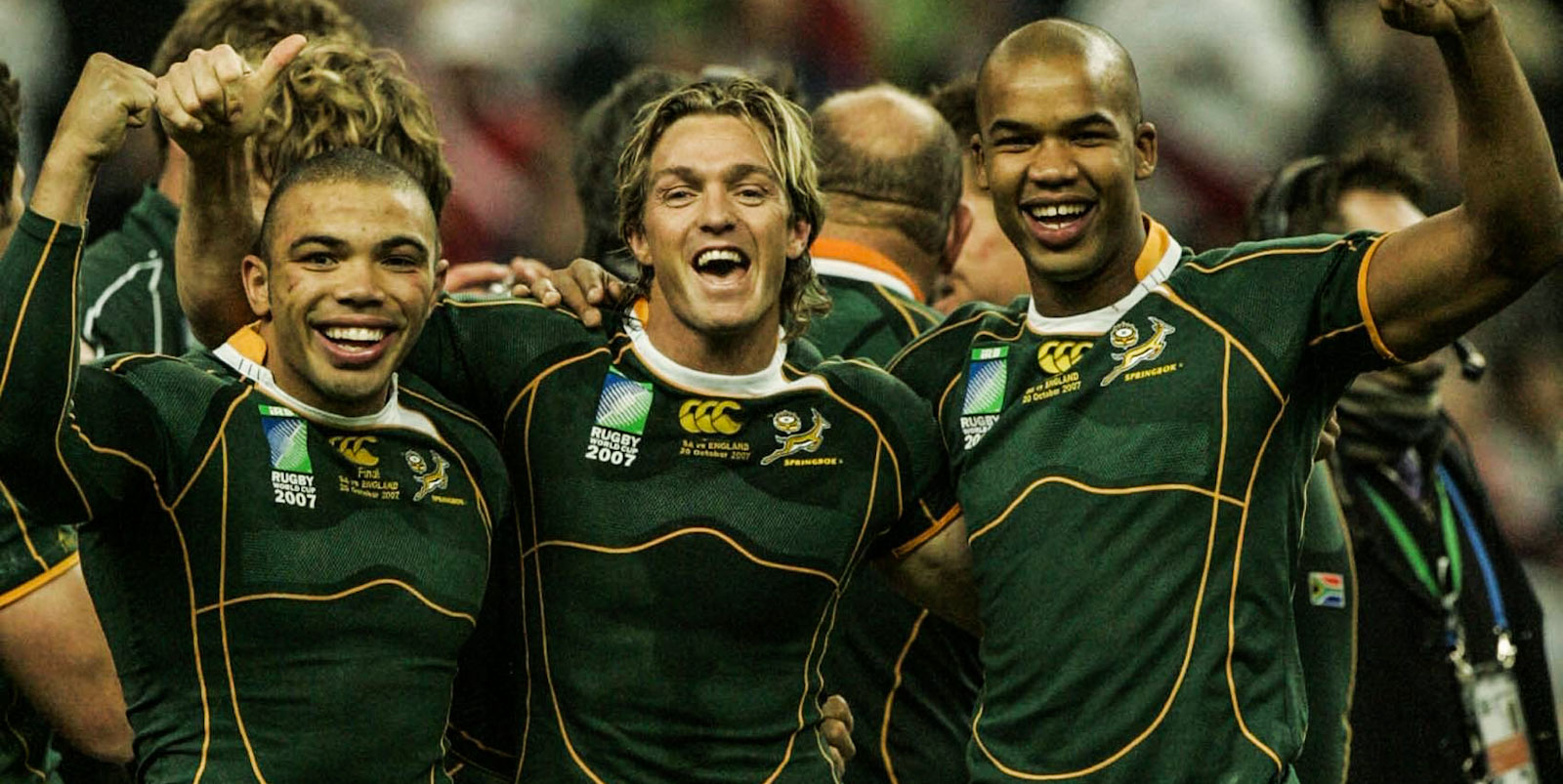 RWC-winning back three - Bryan Habana, Percy Montgomery and JP Pietersen celebrate in Paris