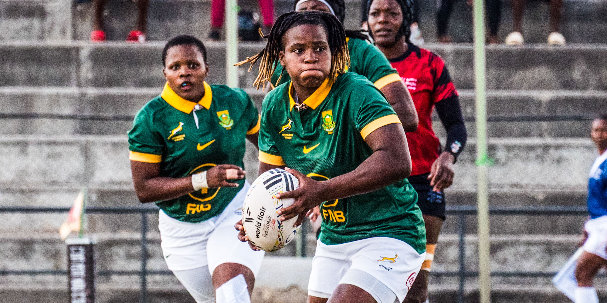 Mary Zulu looks to send the ball wide.