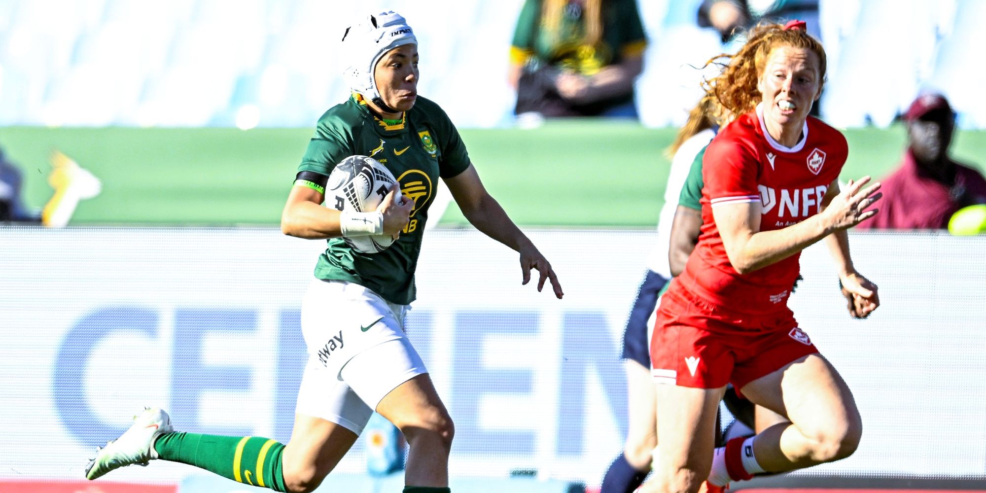 Byrhandre Dolf on her way to scoring a memorable try against Canada in Pretoria.